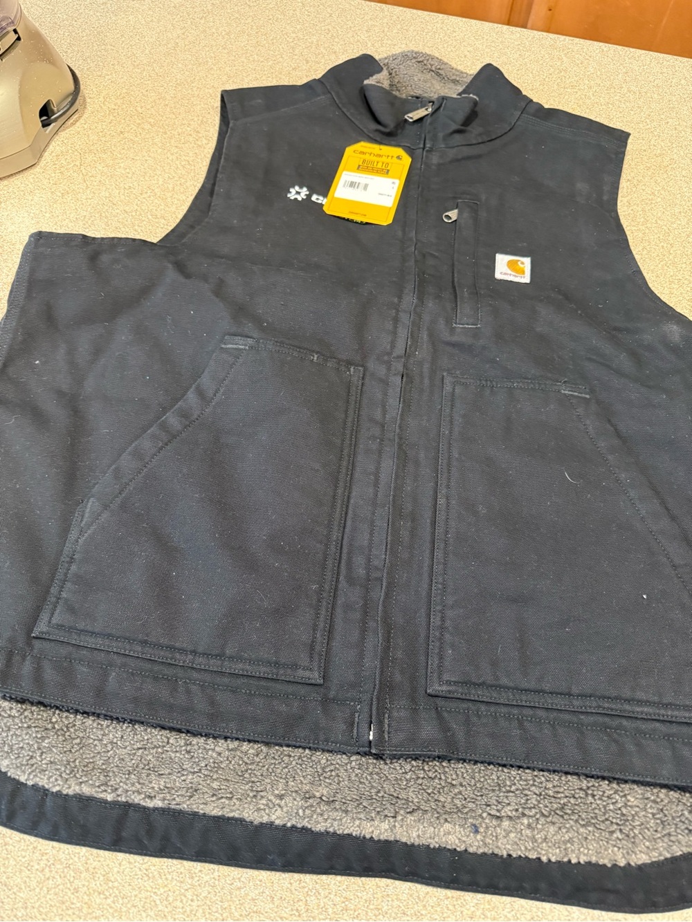 Carhartt Black Work Jacket with Yellow Logo Patch